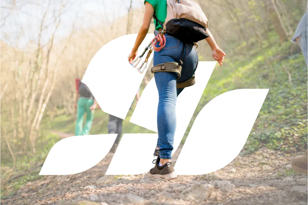 Active adults hiking outdoors in Minnesota representing lifestyle considerations for allergy treatment